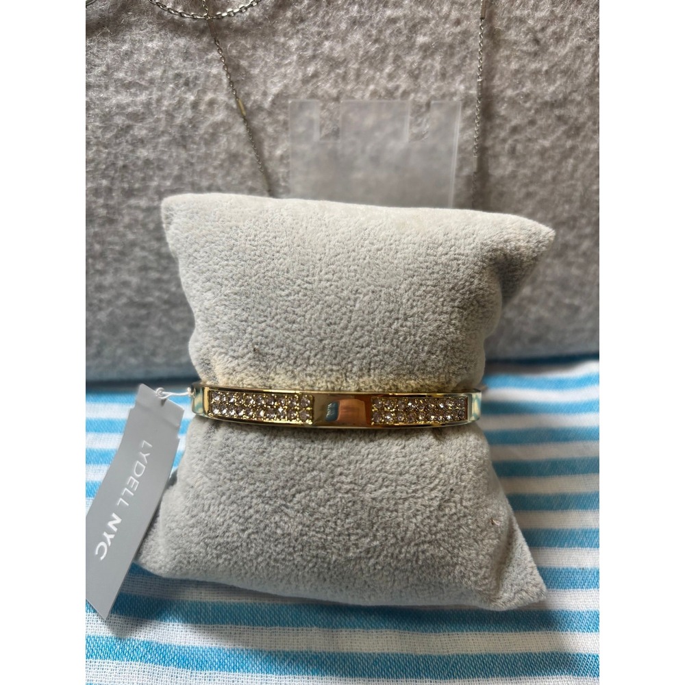 #7. Gold-tone Hinged Bangle